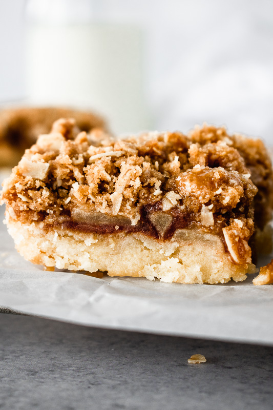 Layered apple pie bar with shortbread crust