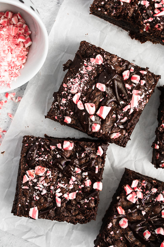 Dark chocolate peppermint brownies with crushed peppermint candies in a bowl