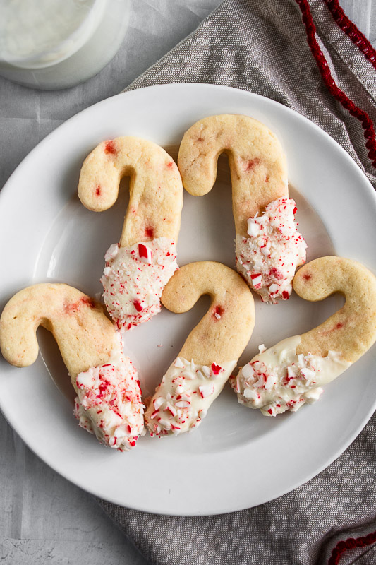 Peppermint candy cane sugar cookies decorated on a white plate