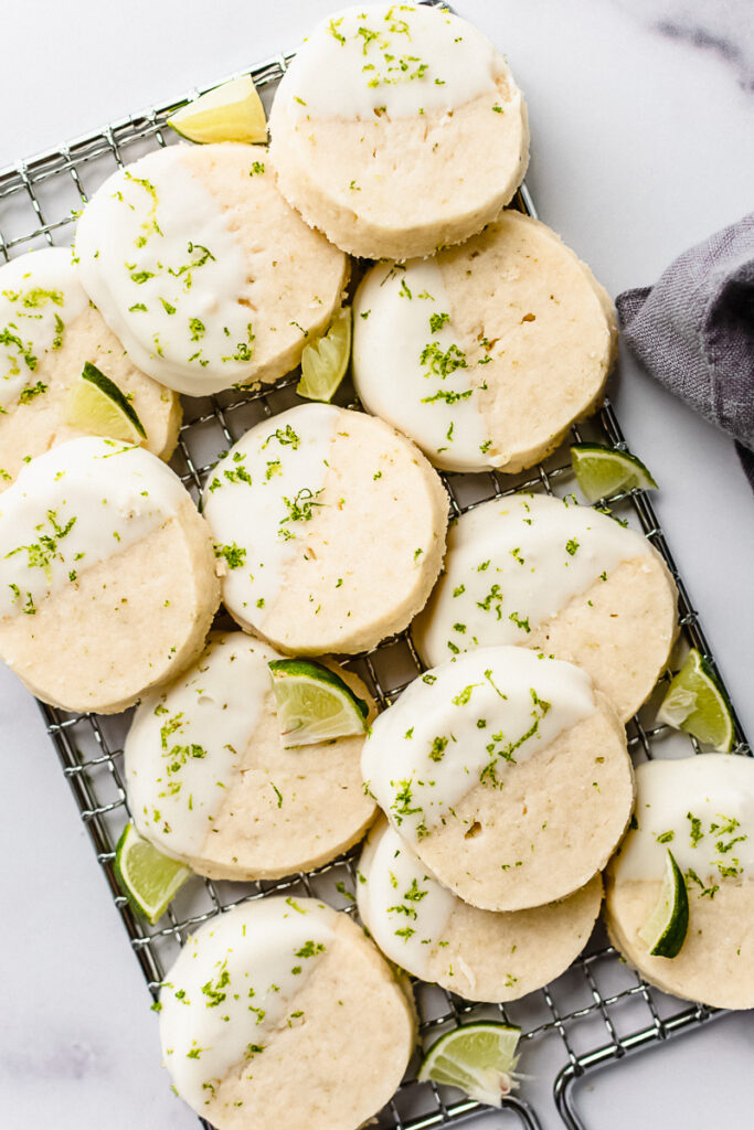 Key lime pie cookies on a metal cooling rack