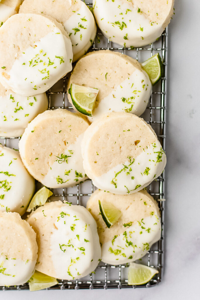 Key lime pie cookies on a metal cooling rack