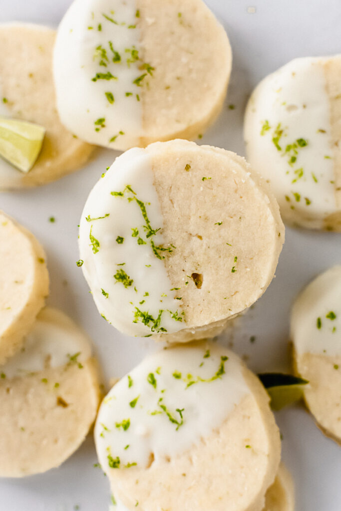 Stack of key lime pie cookies dipped in white chocolate