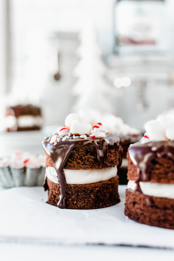 Mini peppermint hot cocoa cakes on parchment paper